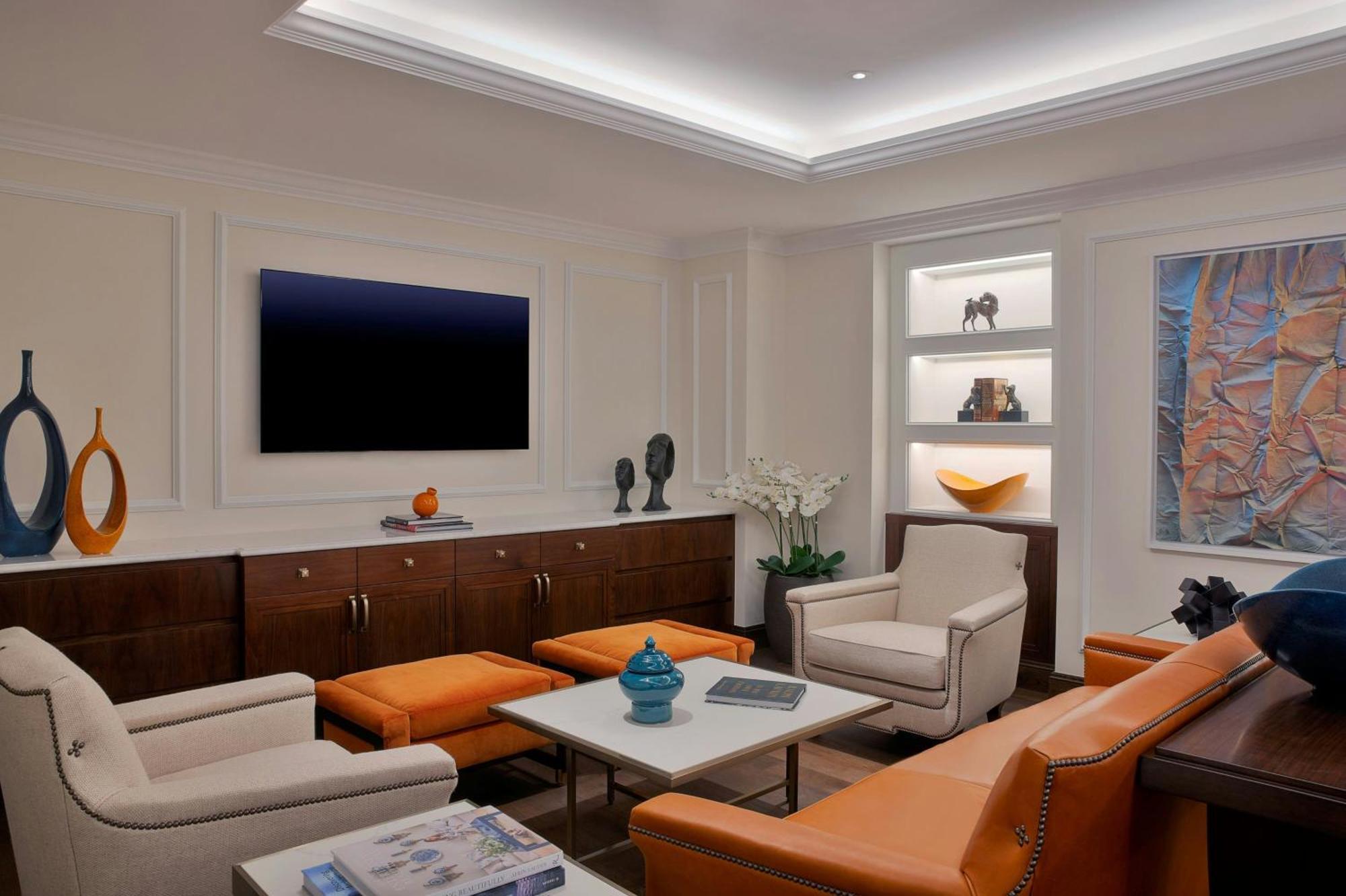 The Ritz-Carlton, Amman Amã Exterior foto A living room with indirect lighting